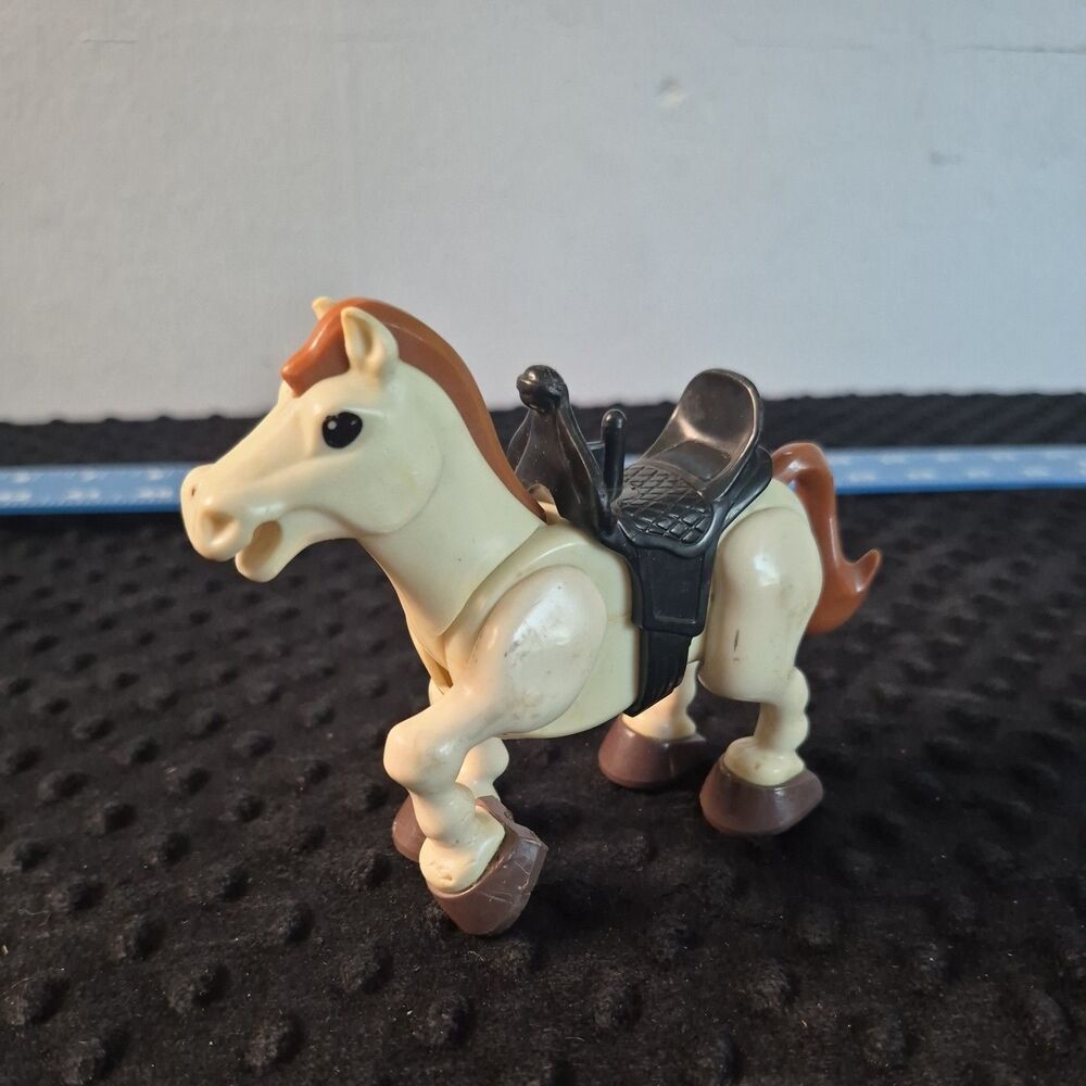1979 vintage FISHER PRICE Husky Helper rodeo white and tan horse with saddle